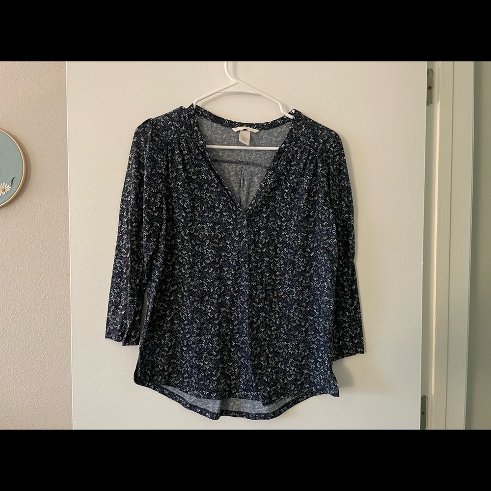 Two H&M patterned summer-weight women’s shirts
